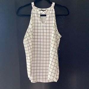 Brand new summer blouse with tag. Size Large